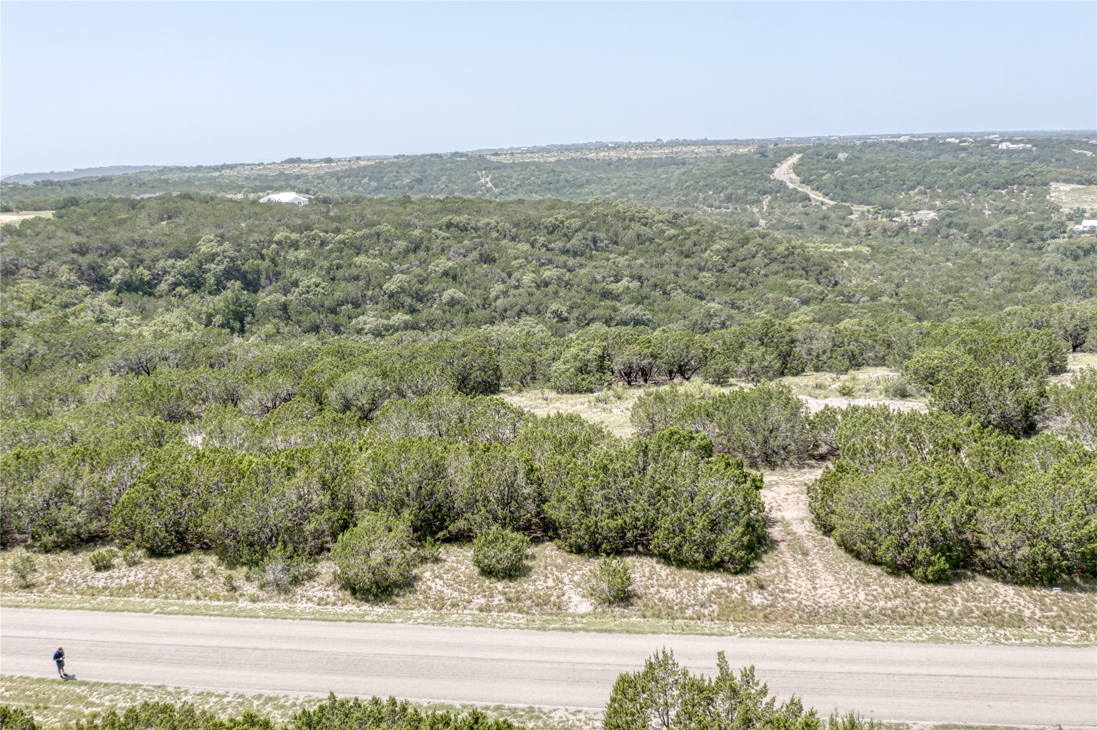 76 Balcones Ridge Way Bertram, TX 78605 - Photo 6 of 15 a view of a city from a yard