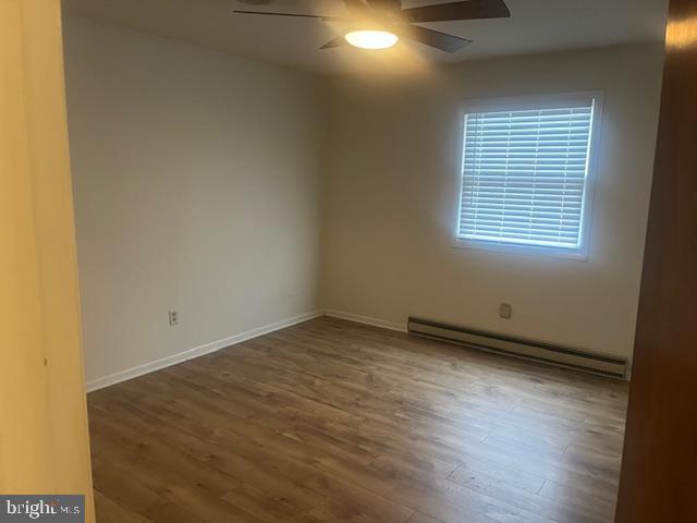 10038 Pleasant View Drive Hagerstown, MD 21740 - Photo 23 of 28 an empty room with wooden floor and windows