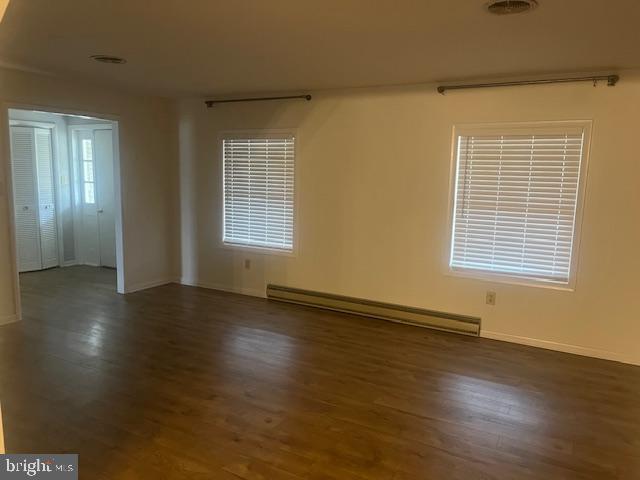 10038 Pleasant View Drive Hagerstown, MD 21740 - Photo 6 of 28 a view of an empty room with wooden floor and a window