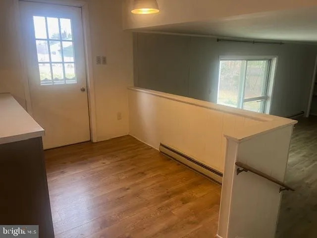 a view of an empty room and window