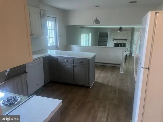 a bathroom with a sink a mirror and a toilet