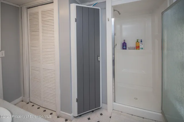 a view of kids room with closet