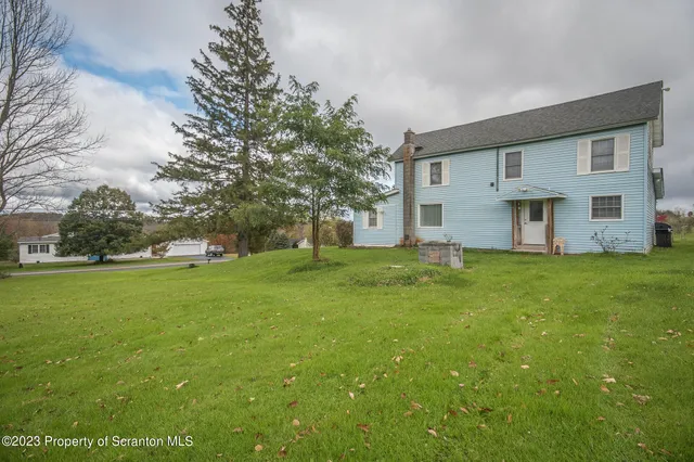 a house view with garden space