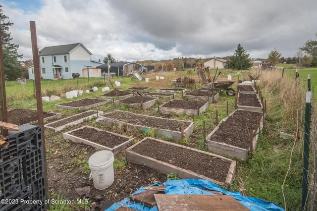 a view of city from terrace with outdoor seating