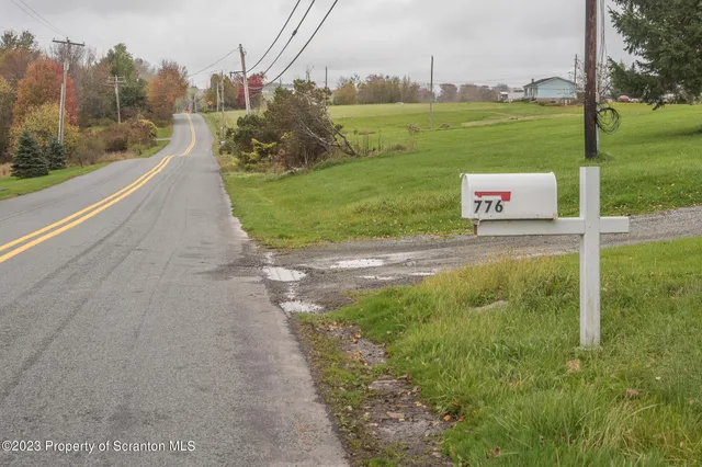 a view of a park with welcome board