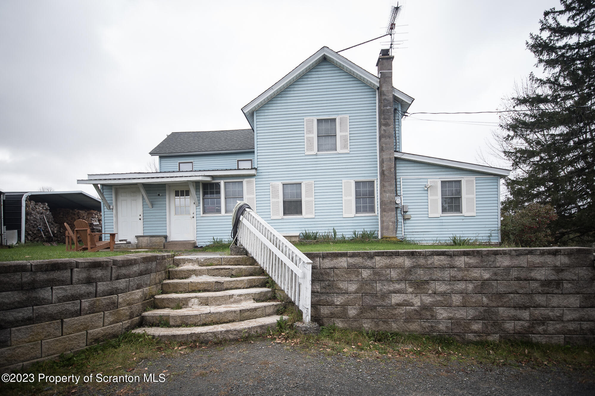 776 Milanville Road Beach Lake, PA 18405 - Photo 4 of 28 a front view of a house with a yard