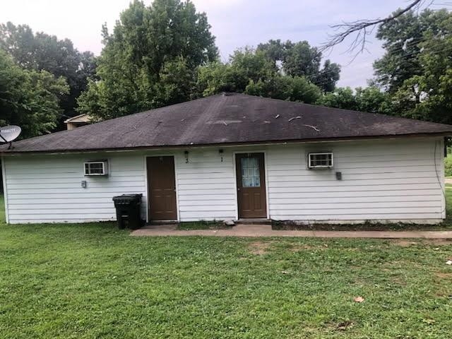 132 Stardust Drive Ripley, TN 38063 - Photo 2 of 10 Single-story property with white siding and a dark shingle roof