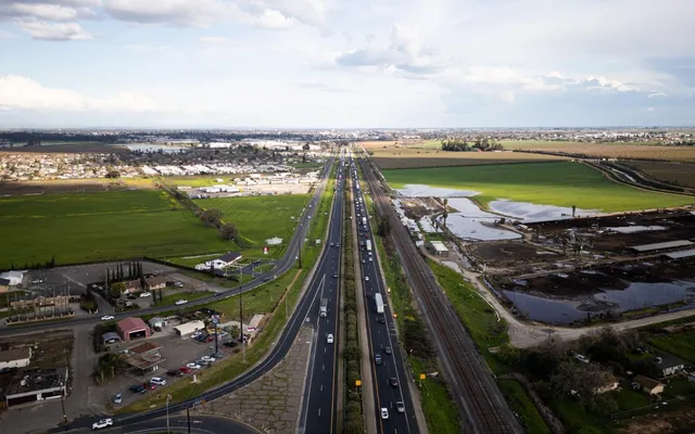 a view of a balcony with an ocean