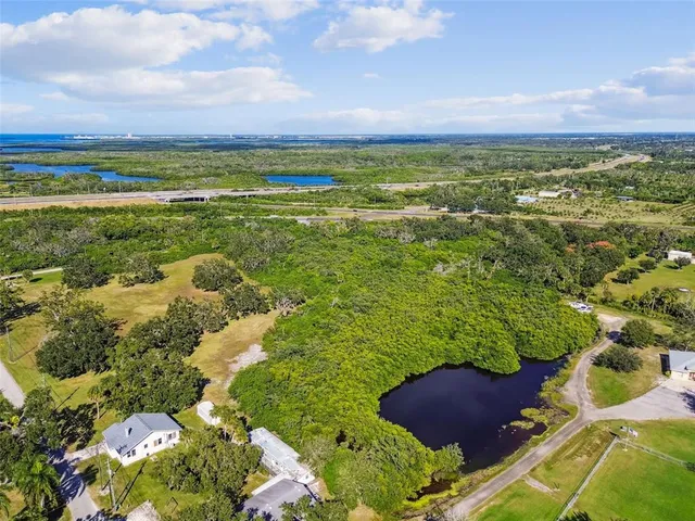 a view of an ocean and a yard