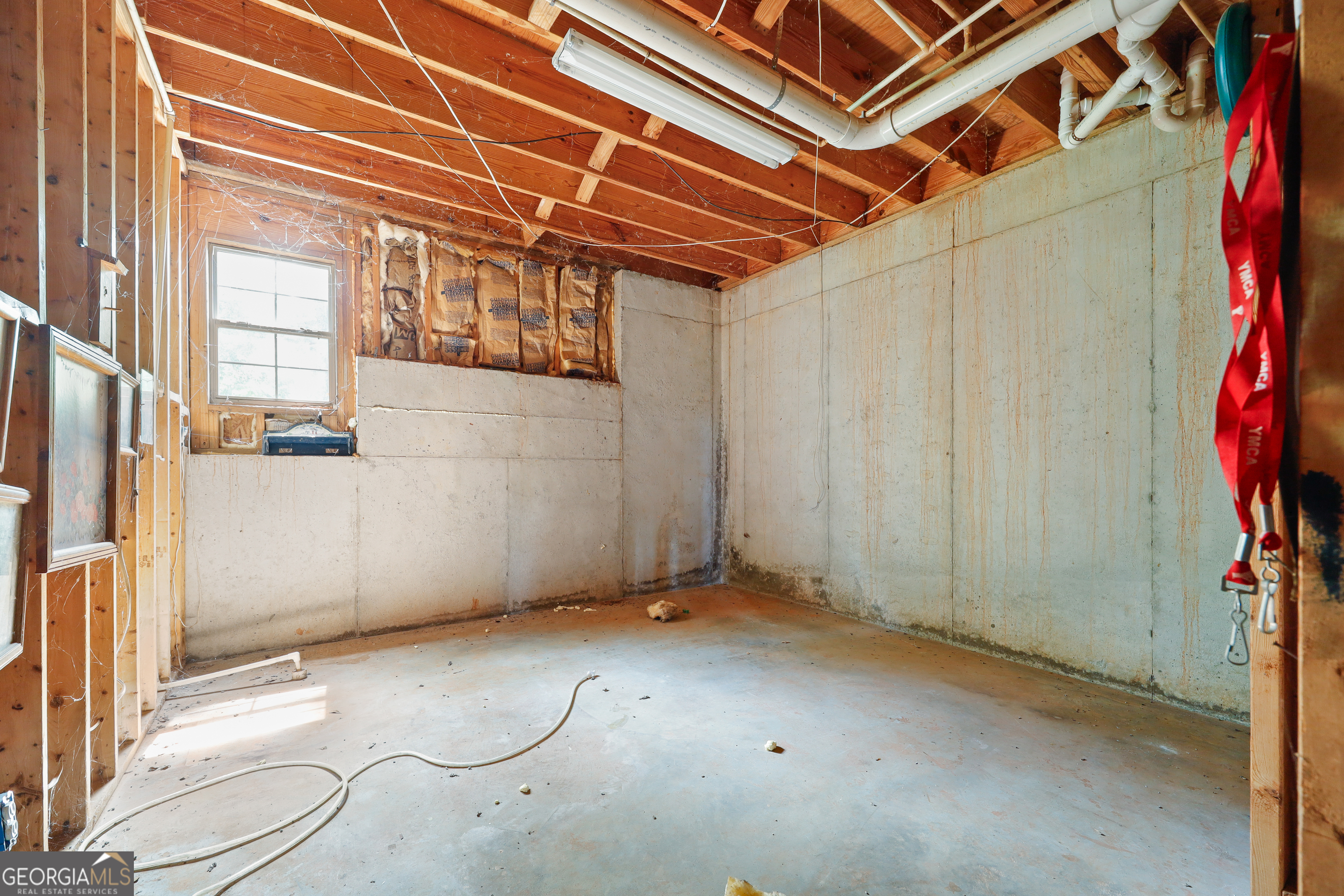 2433 Bear Creek Road Statham, GA 30666 - Photo 38 of 58 a view of a room with wooden walls