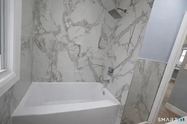 a bathroom with a bathtub