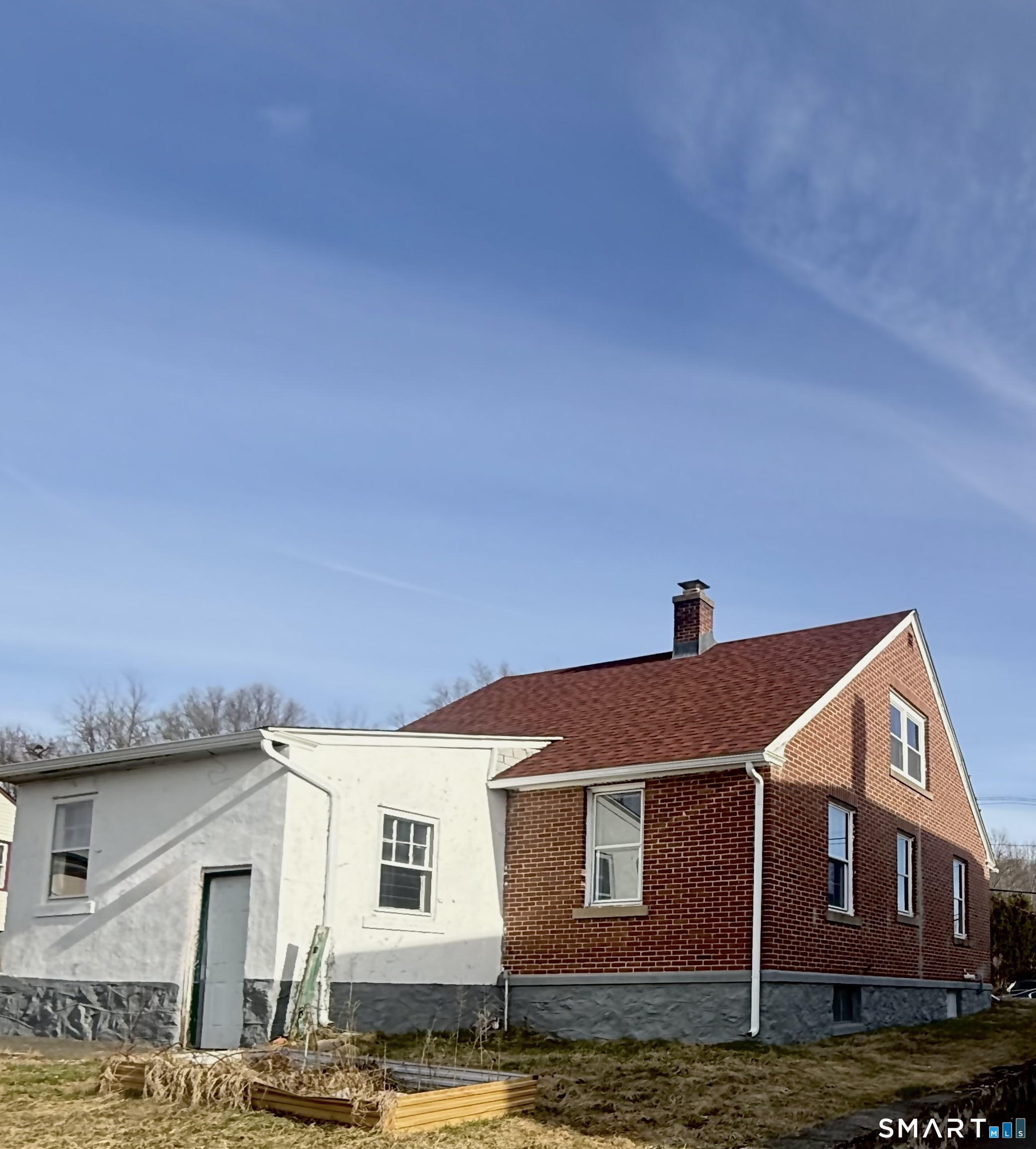 212 Platt Street Waterbury, CT 06704 - Photo 21 of 27 a front view of a house with a yard