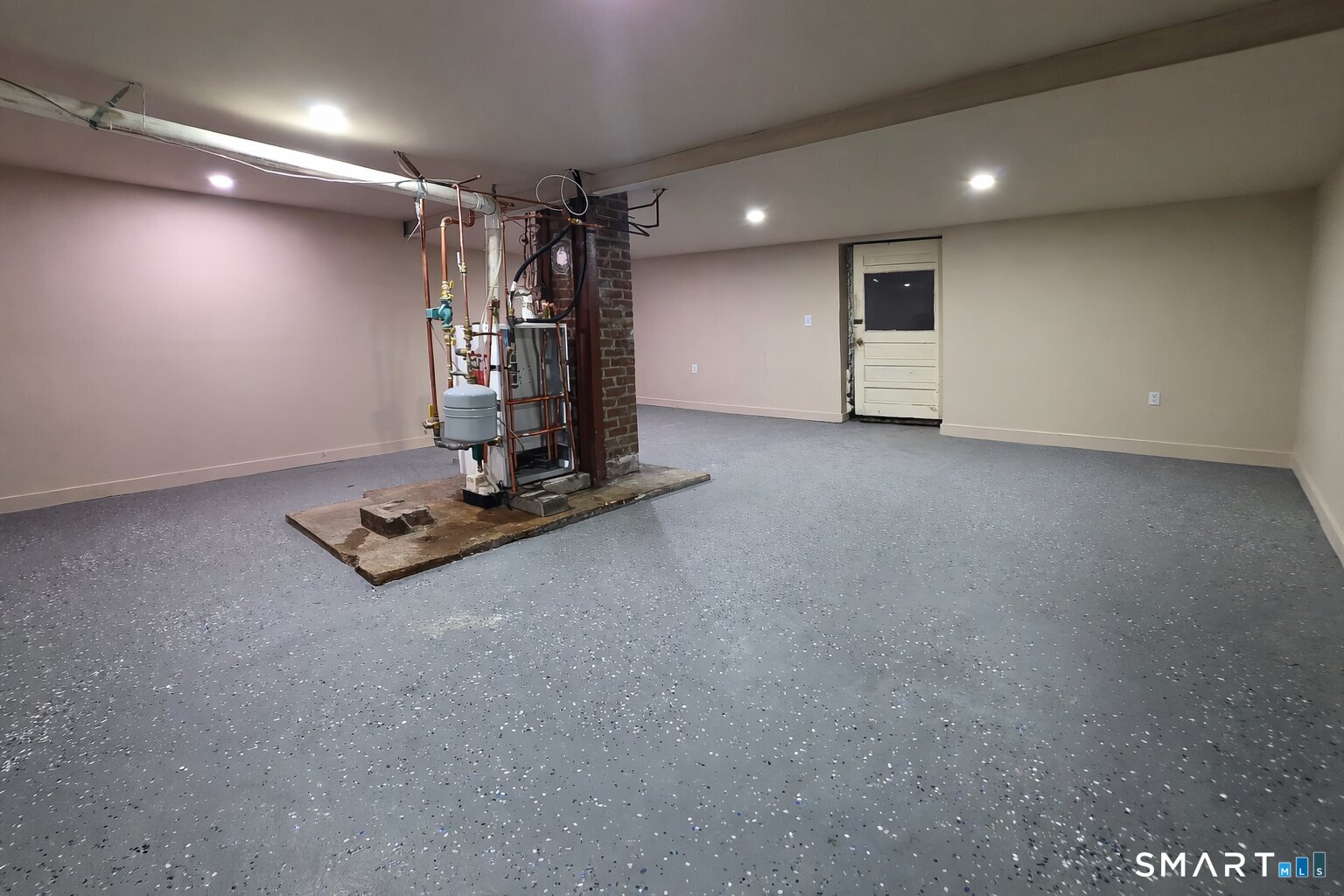 212 Platt Street Waterbury, CT 06704 - Photo 22 of 27 a view of a room with gym equipment