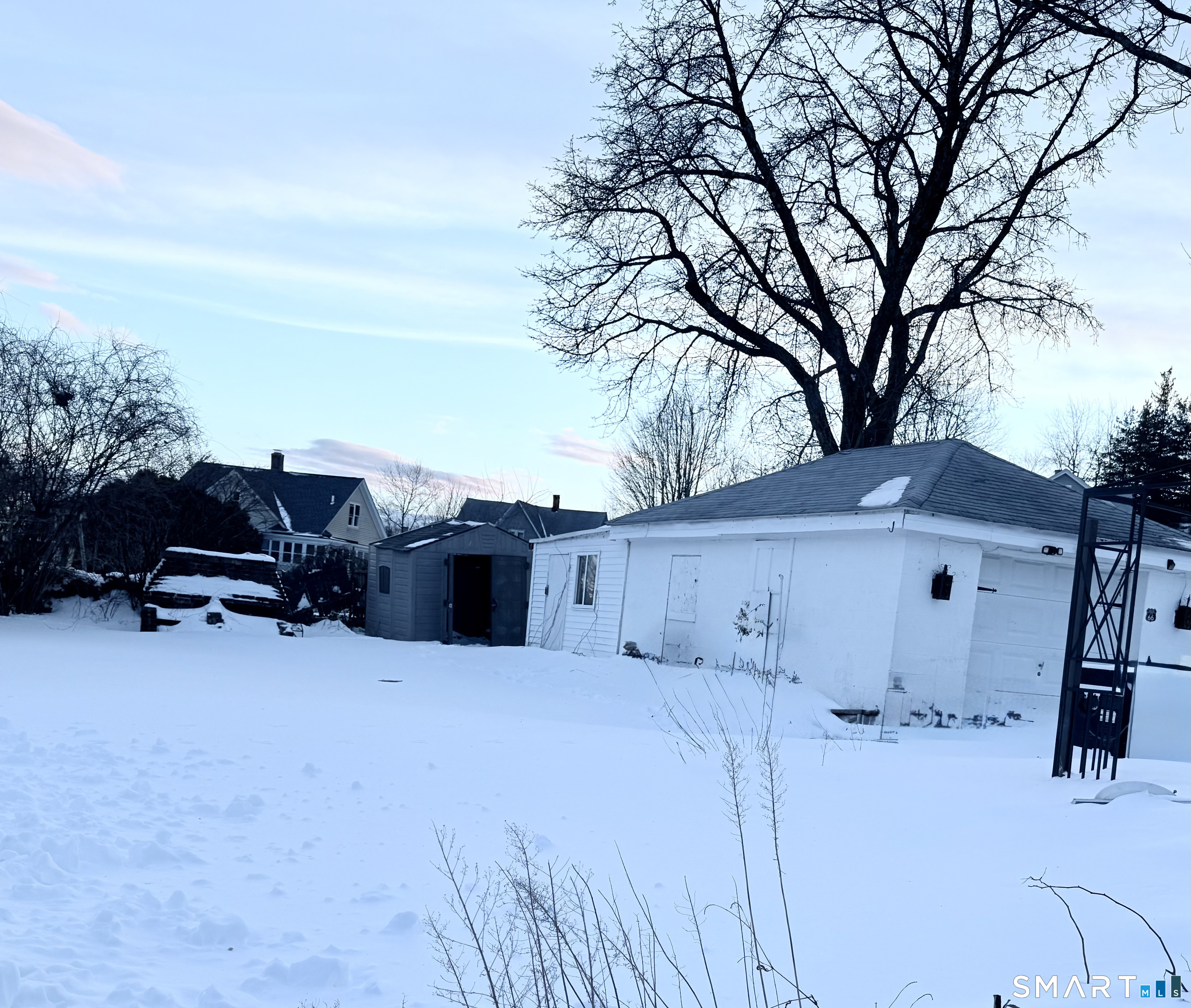 212 Platt Street Waterbury, CT 06704 - Photo 6 of 23 a view of a house with furniture in backyard
