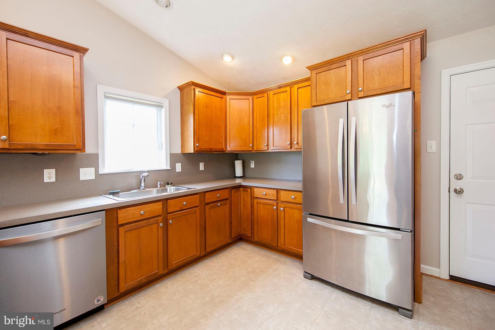 103 Longcroft Road Winchester, VA 22602 - Photo 13 of 52 Vaulted ceilings and recessed lighting in kitchen