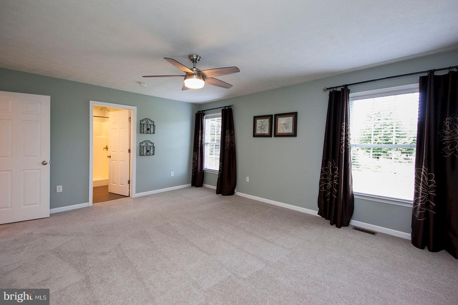 103 Longcroft Road Winchester, VA 22602 - Photo 15 of 52 Large master with new carpet and neutral walls