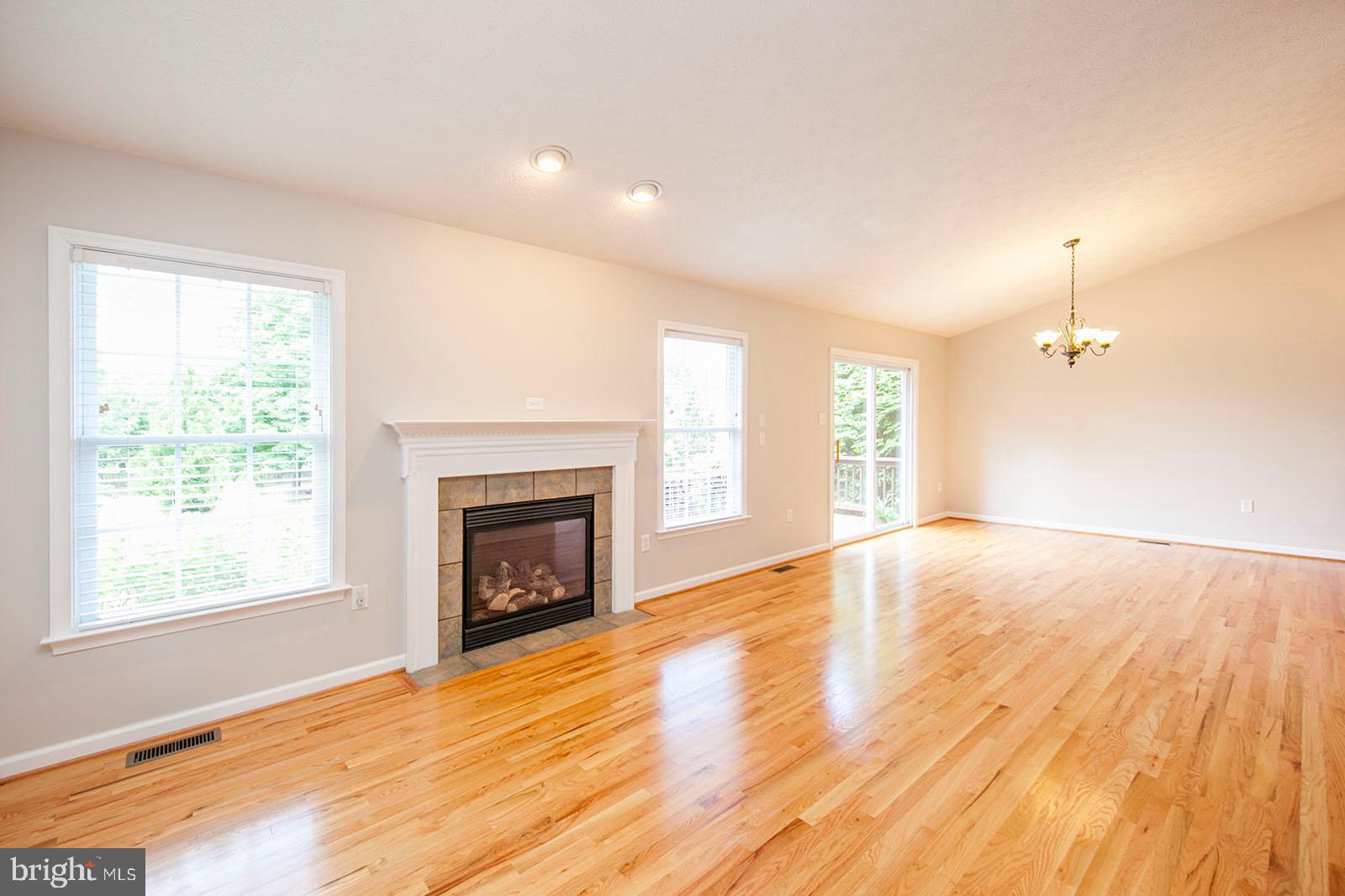 103 Longcroft Road Winchester, VA 22602 - Photo 6 of 52 Gas fireplace and vaulted ceilings in LR