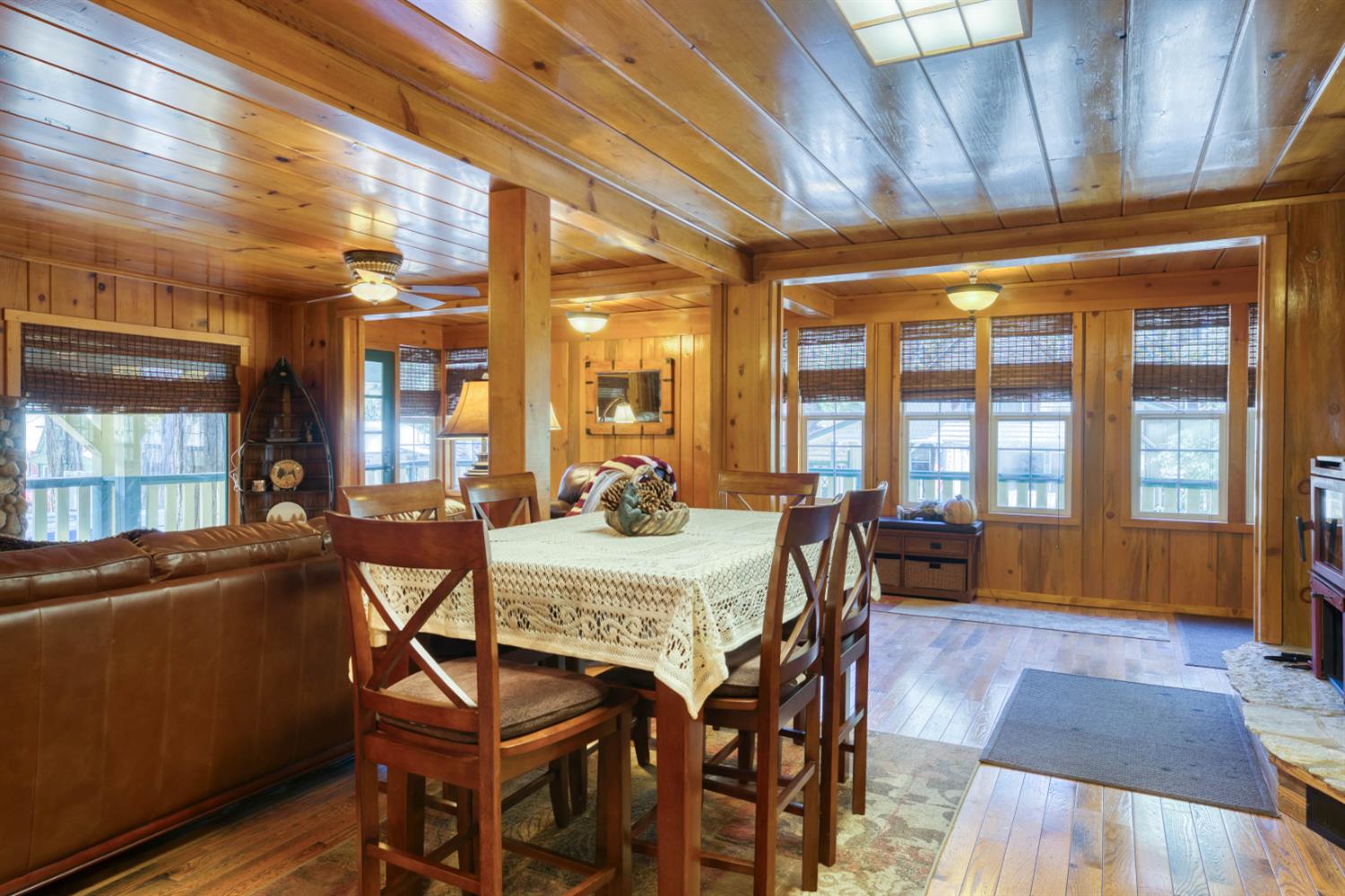 42025 Tollhouse Road Shaver Lake, CA 93664 - Photo 28 of 64 a view of a dining room with furniture window and wooden floor