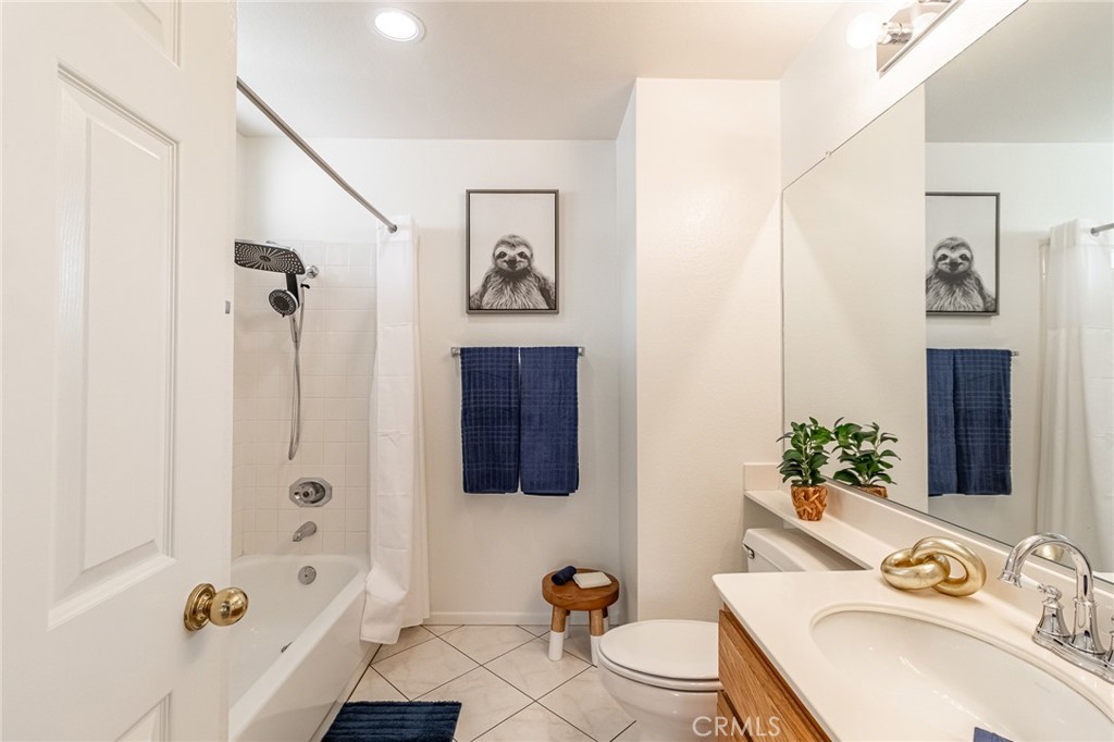 7529 Hardy Avenue Rancho Cucamonga, CA 91730 - Photo 22 of 38 a bathroom with a sink toilet and shower