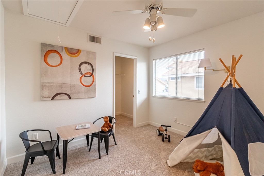 7529 Hardy Avenue Rancho Cucamonga, CA 91730 - Photo 24 of 38 a view of a livingroom with furniture and window