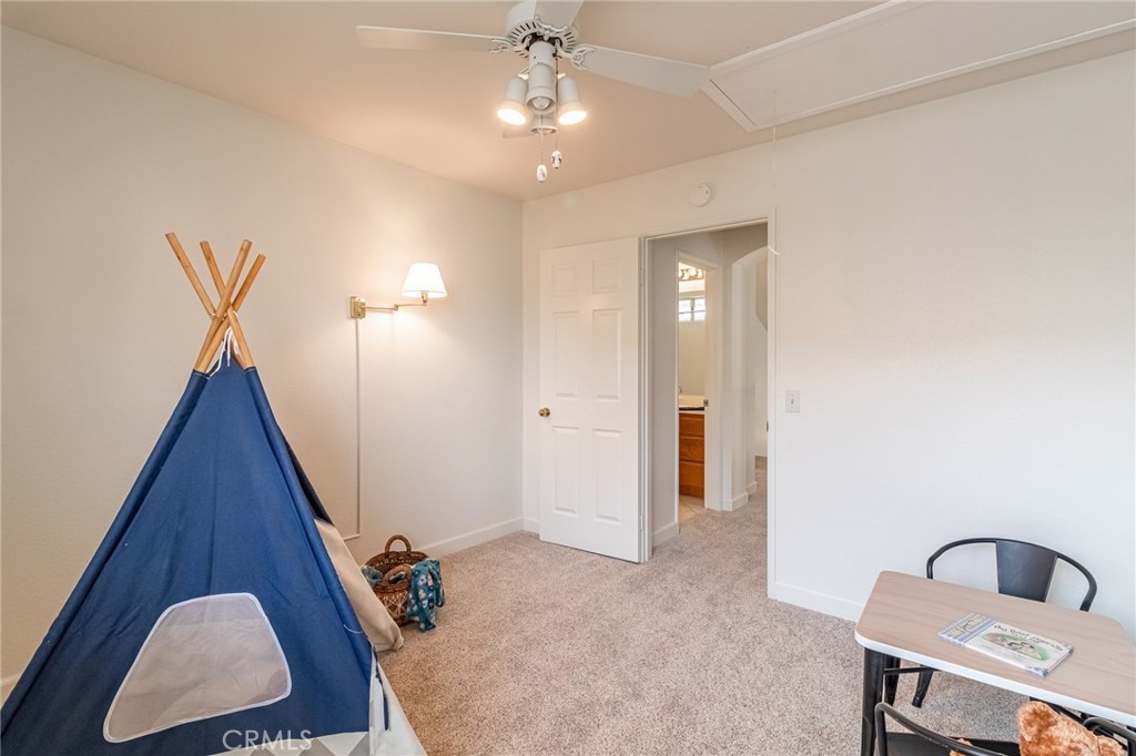 7529 Hardy Avenue Rancho Cucamonga, CA 91730 - Photo 25 of 38 a view of room with furniture and wooden floor