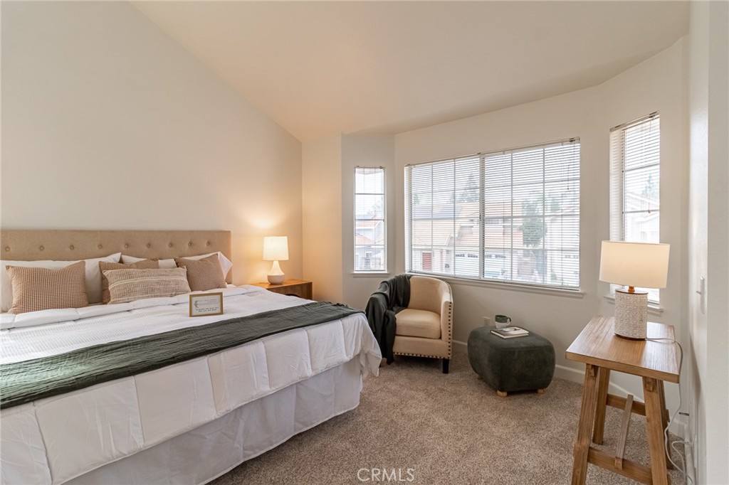 7529 Hardy Avenue Rancho Cucamonga, CA 91730 - Photo 27 of 38 a bedroom with a bed and a couch