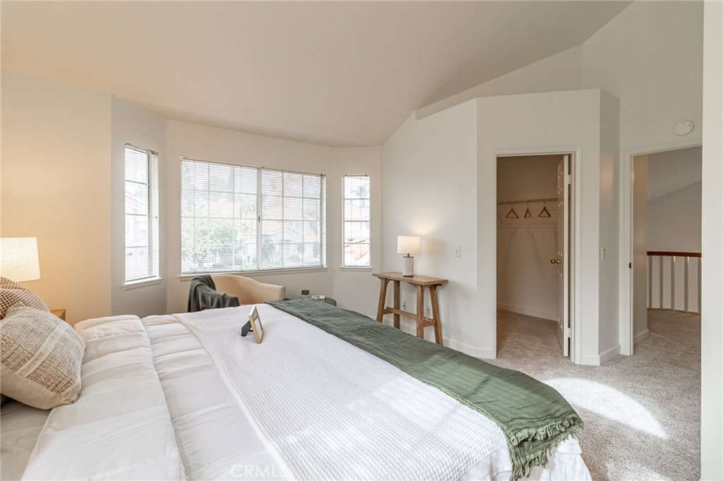 7529 Hardy Avenue Rancho Cucamonga, CA 91730 - Photo 28 of 38 a bedroom with a bed and a window