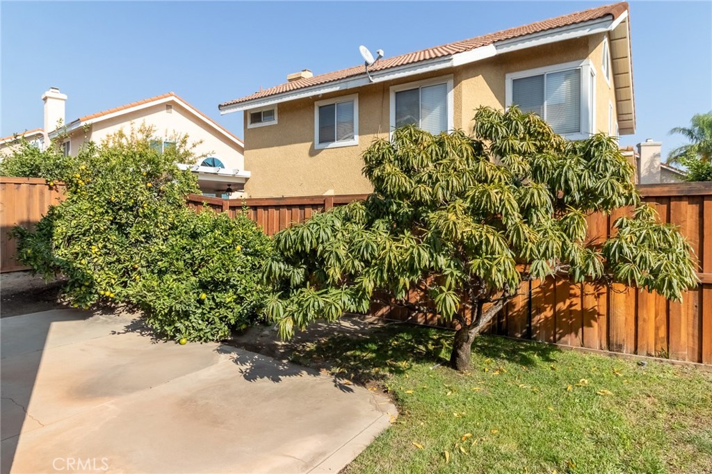 7529 Hardy Avenue Rancho Cucamonga, CA 91730 - Photo 33 of 38 a view of a house with a yard