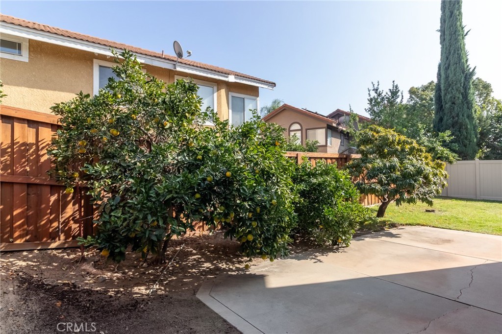 7529 Hardy Avenue Rancho Cucamonga, CA 91730 - Photo 34 of 38 a front view of a house with a yard