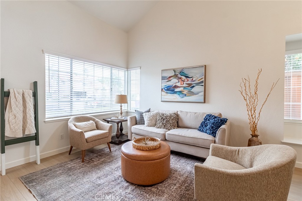7529 Hardy Avenue Rancho Cucamonga, CA 91730 - Photo 5 of 38 a living room with furniture and a large window