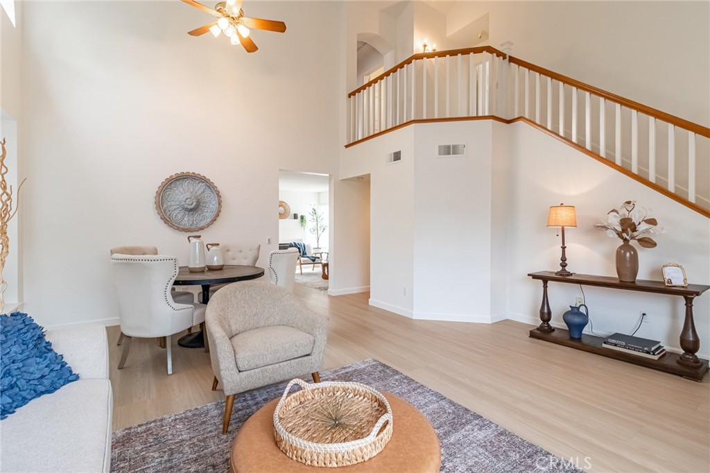7529 Hardy Avenue Rancho Cucamonga, CA 91730 - Photo 6 of 38 a living room with furniture a rug and a window