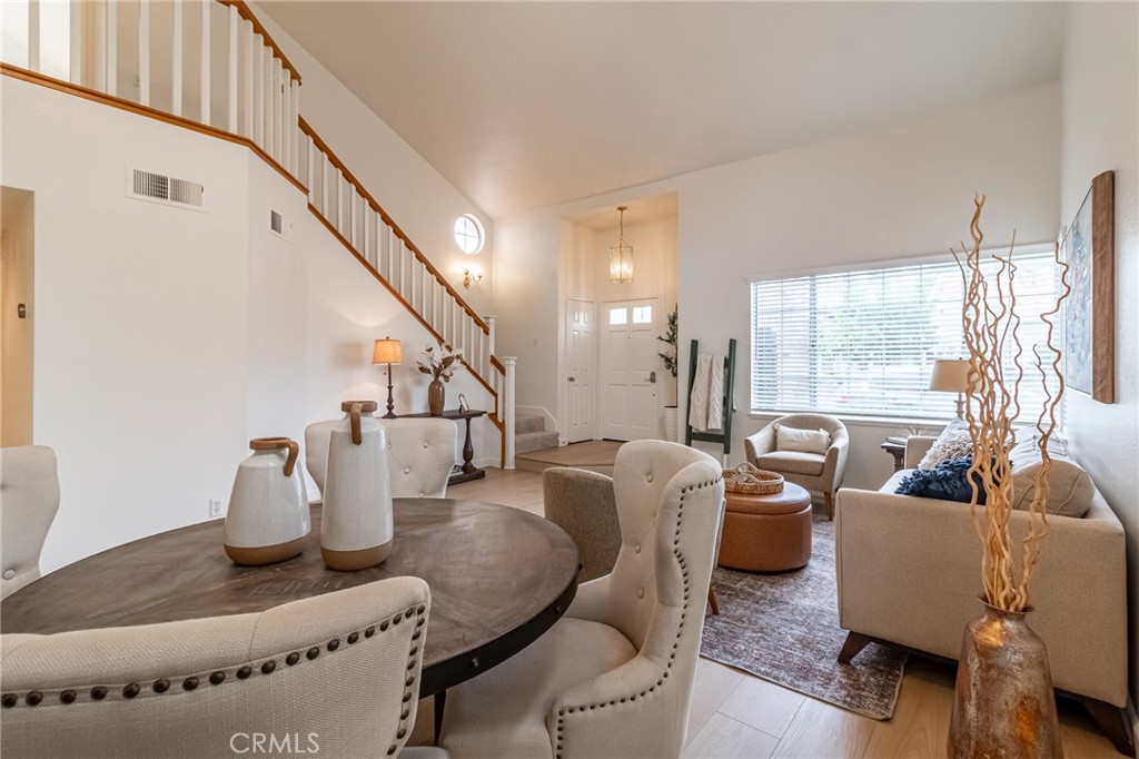7529 Hardy Avenue Rancho Cucamonga, CA 91730 - Photo 9 of 38 a living room with furniture and a potted plant