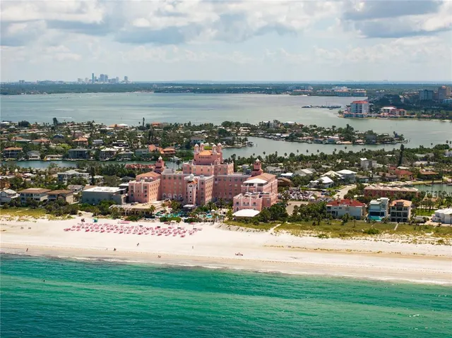 a view of a livingroom with furniture and a window