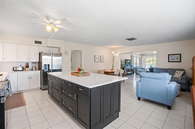 a bedroom with two beds and a window