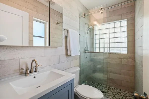 a view of swimming pool with a table and chairs
