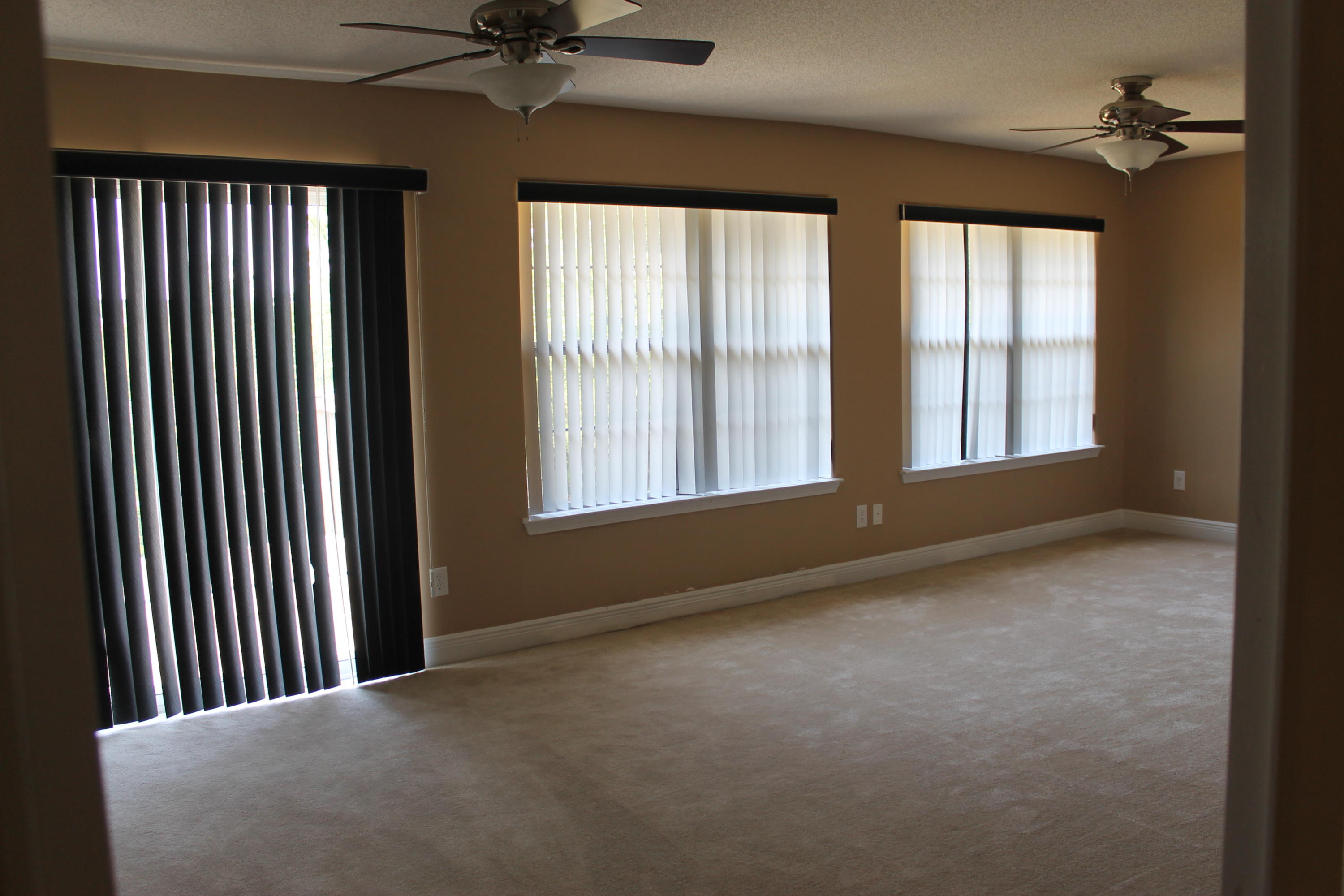 213 Foxchase Way Crestview, FL 32536 - Photo 13 of 34 a view of an empty room with a window