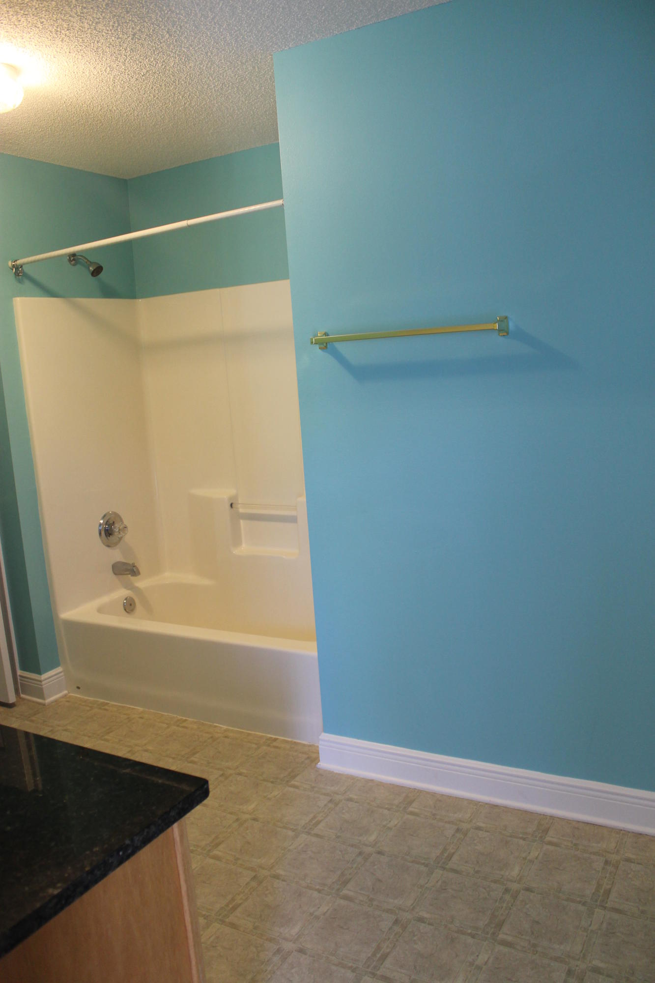 213 Foxchase Way Crestview, FL 32536 - Photo 14 of 34 a bathroom with a bathtub and a shower