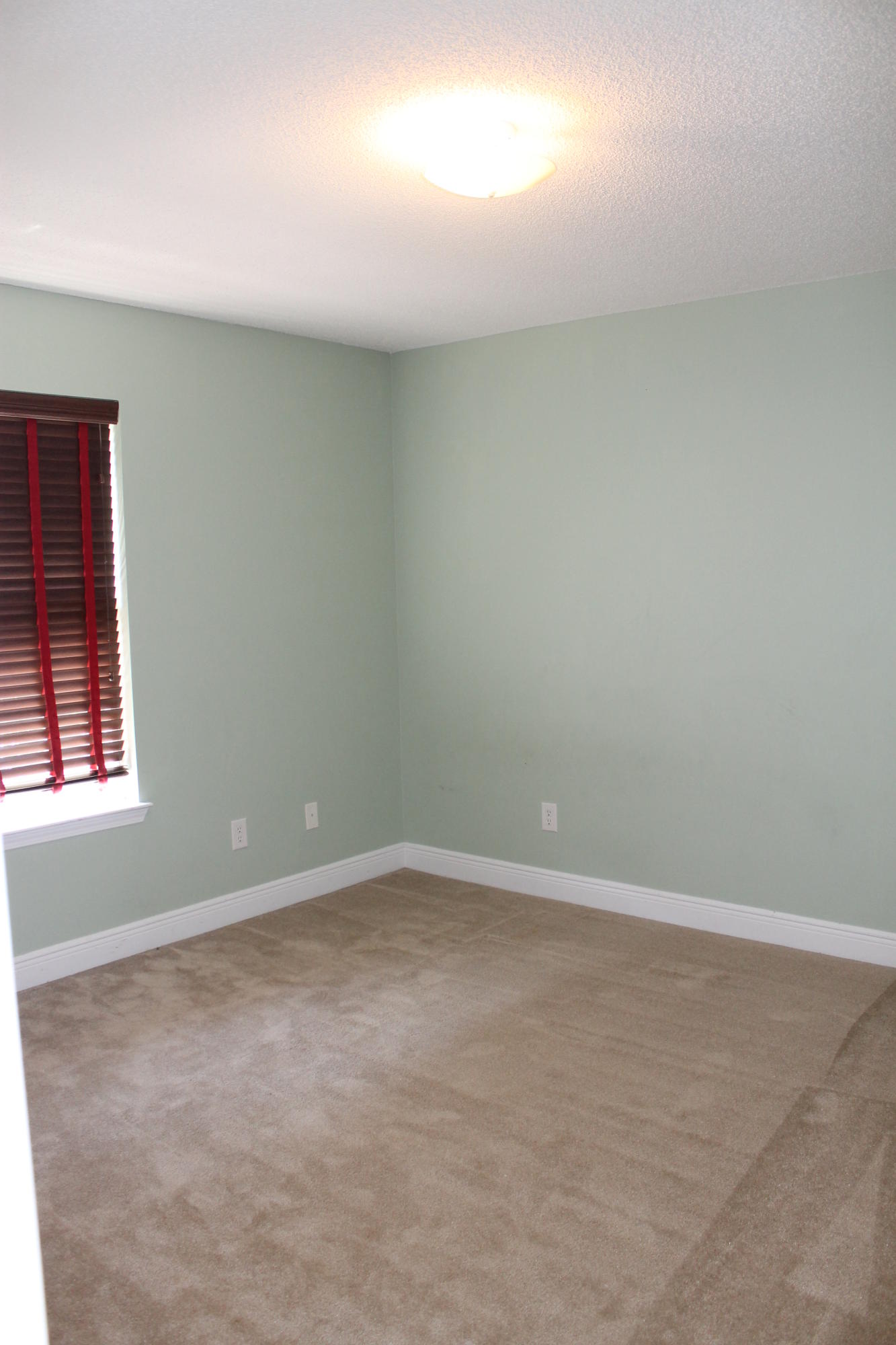213 Foxchase Way Crestview, FL 32536 - Photo 19 of 34 an empty room with windows