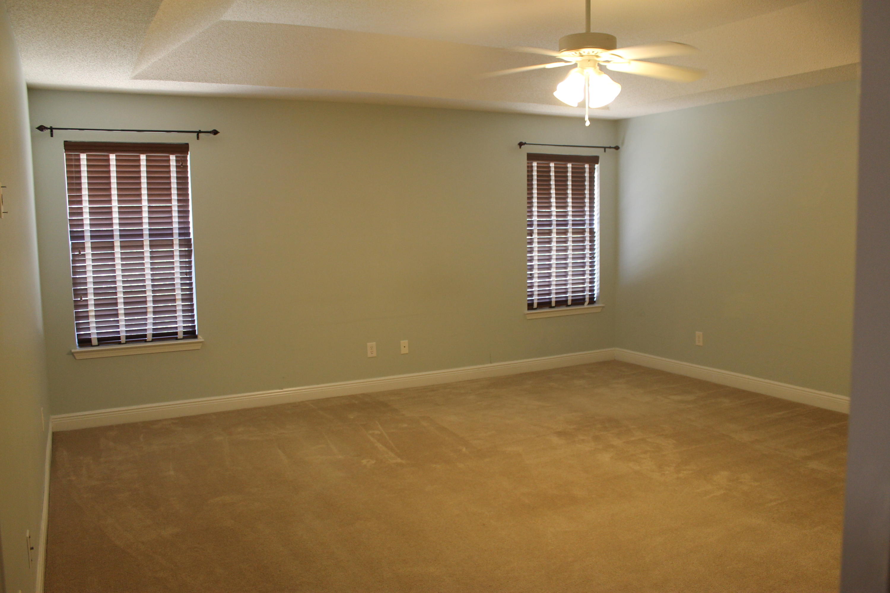 213 Foxchase Way Crestview, FL 32536 - Photo 21 of 34 a view of an empty room with a window