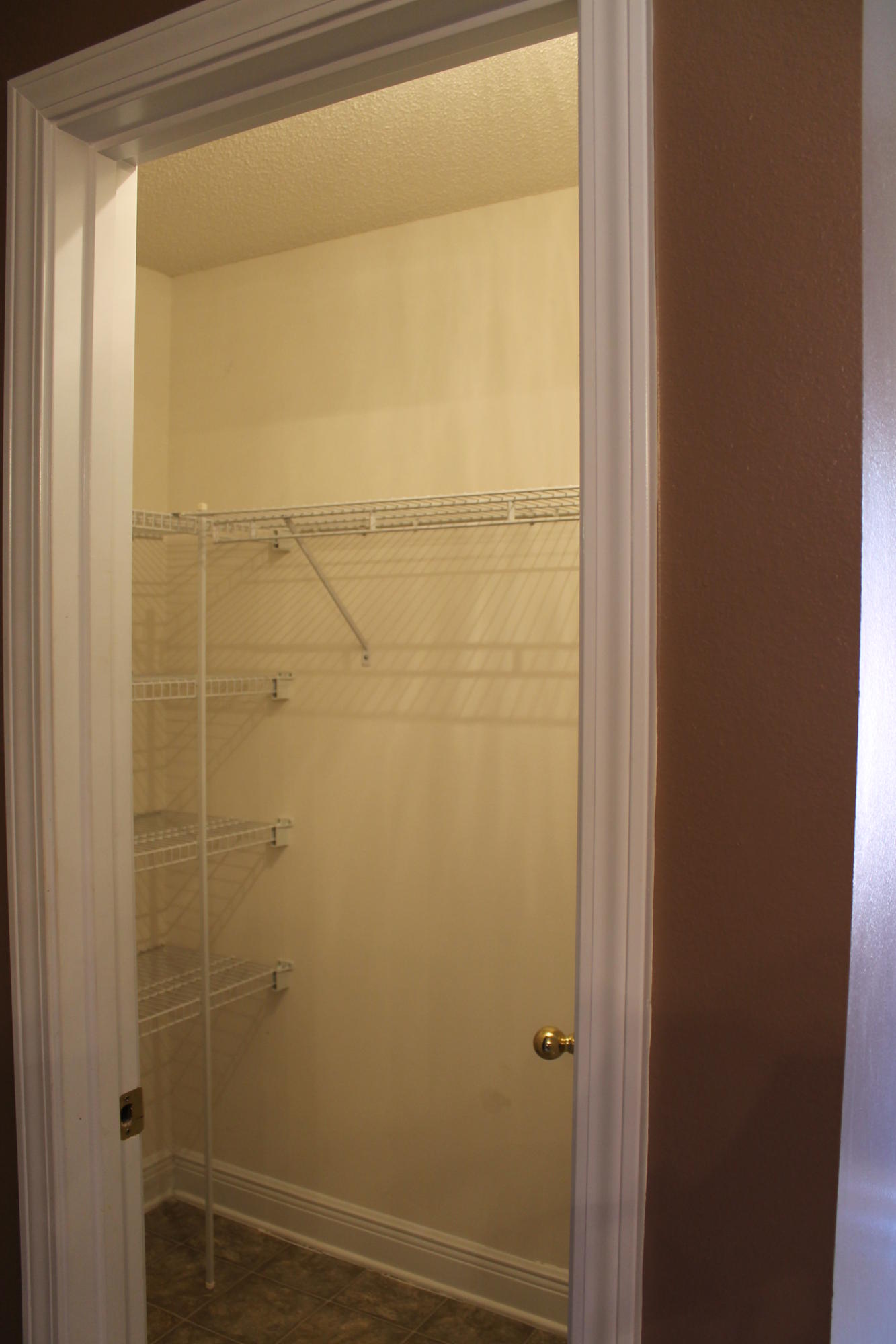 213 Foxchase Way Crestview, FL 32536 - Photo 26 of 34 a bathroom with a glass shower door
