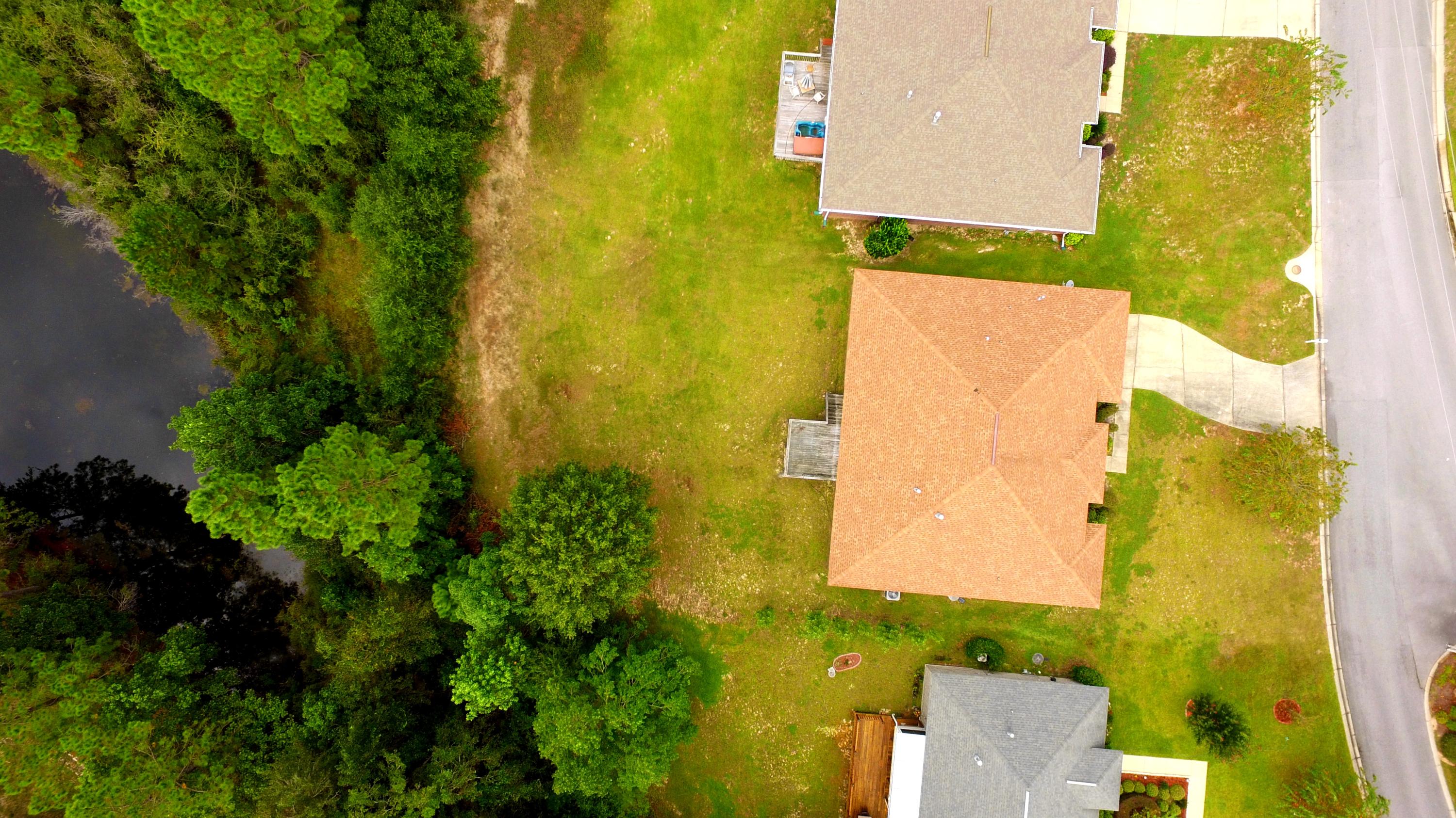 213 Foxchase Way Crestview, FL 32536 - Photo 30 of 34 an aerial view of a residential houses with swimming pool