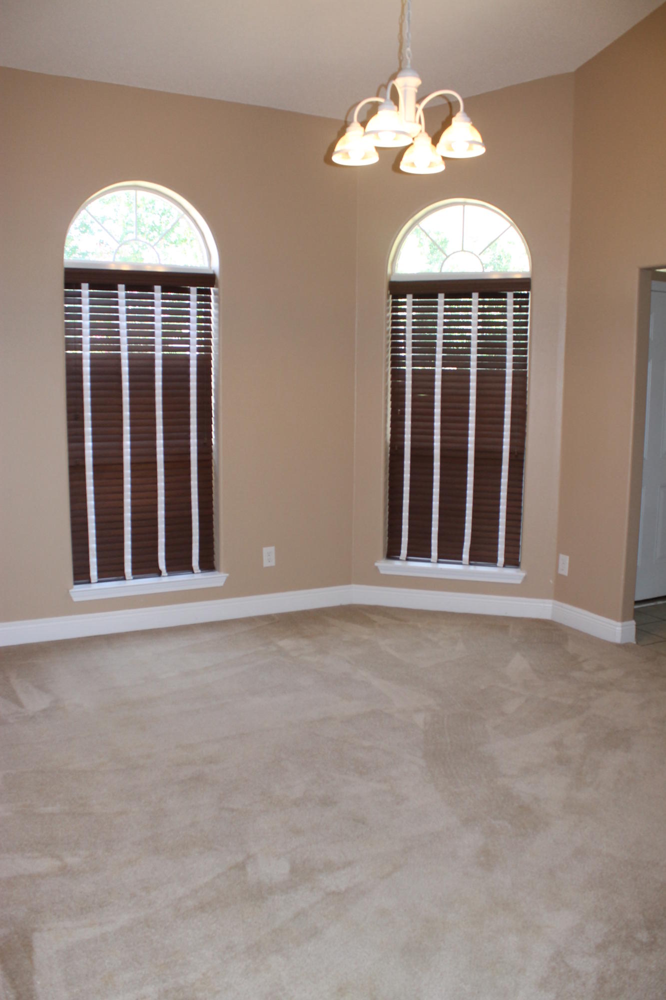 213 Foxchase Way Crestview, FL 32536 - Photo 6 of 34 a view of an empty room with a window