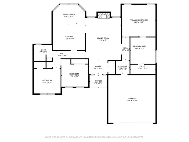 a kitchen with stainless steel appliances a stove top oven a sink a window and cabinets