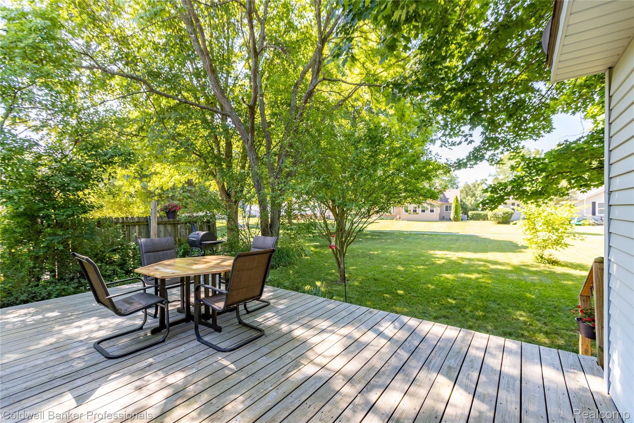 Deck off family room and back of home