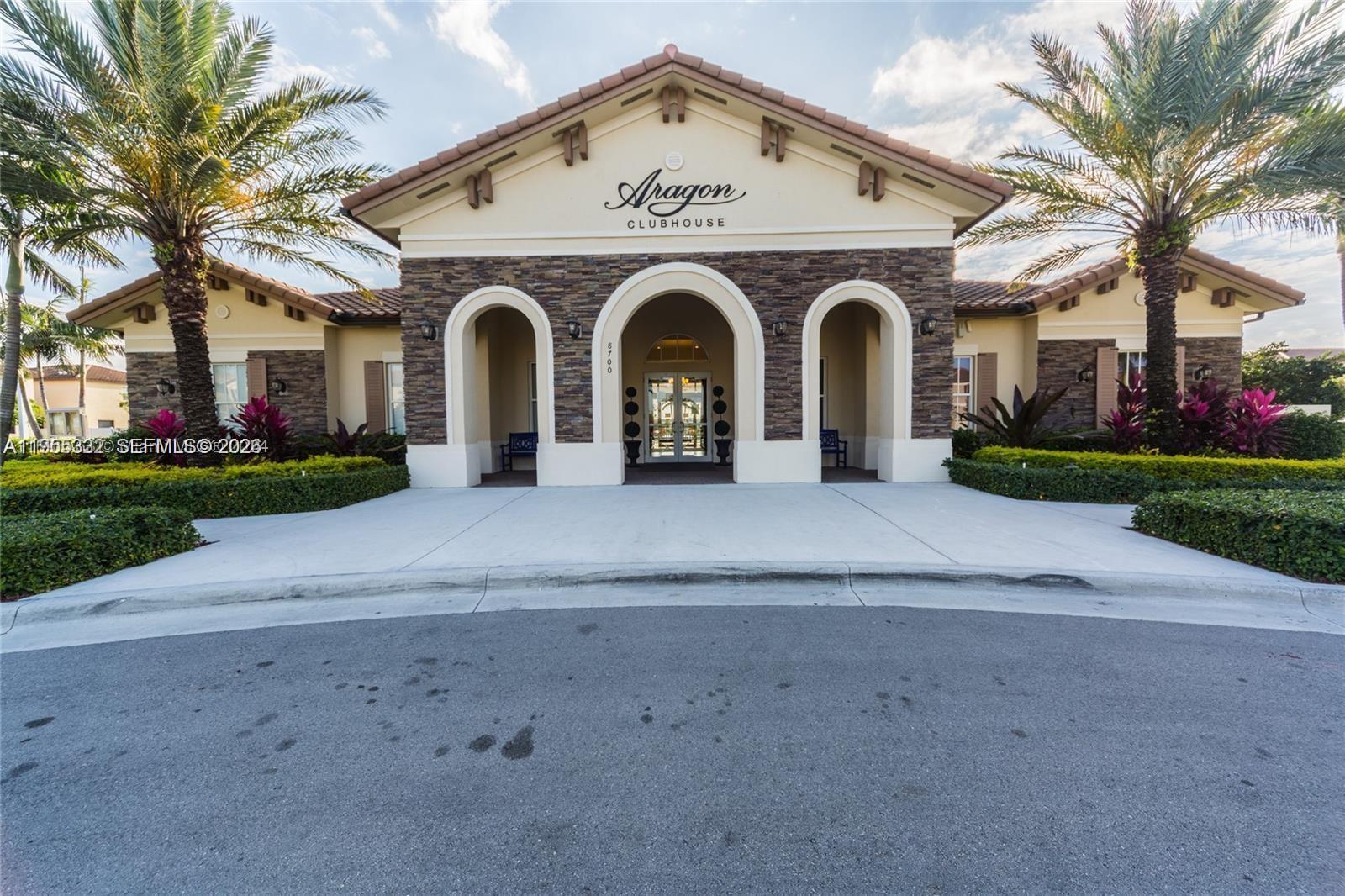 3353 West 91st Terrace Hialeah, FL 33018 - Photo 2 of 21 a front view of a house with garden