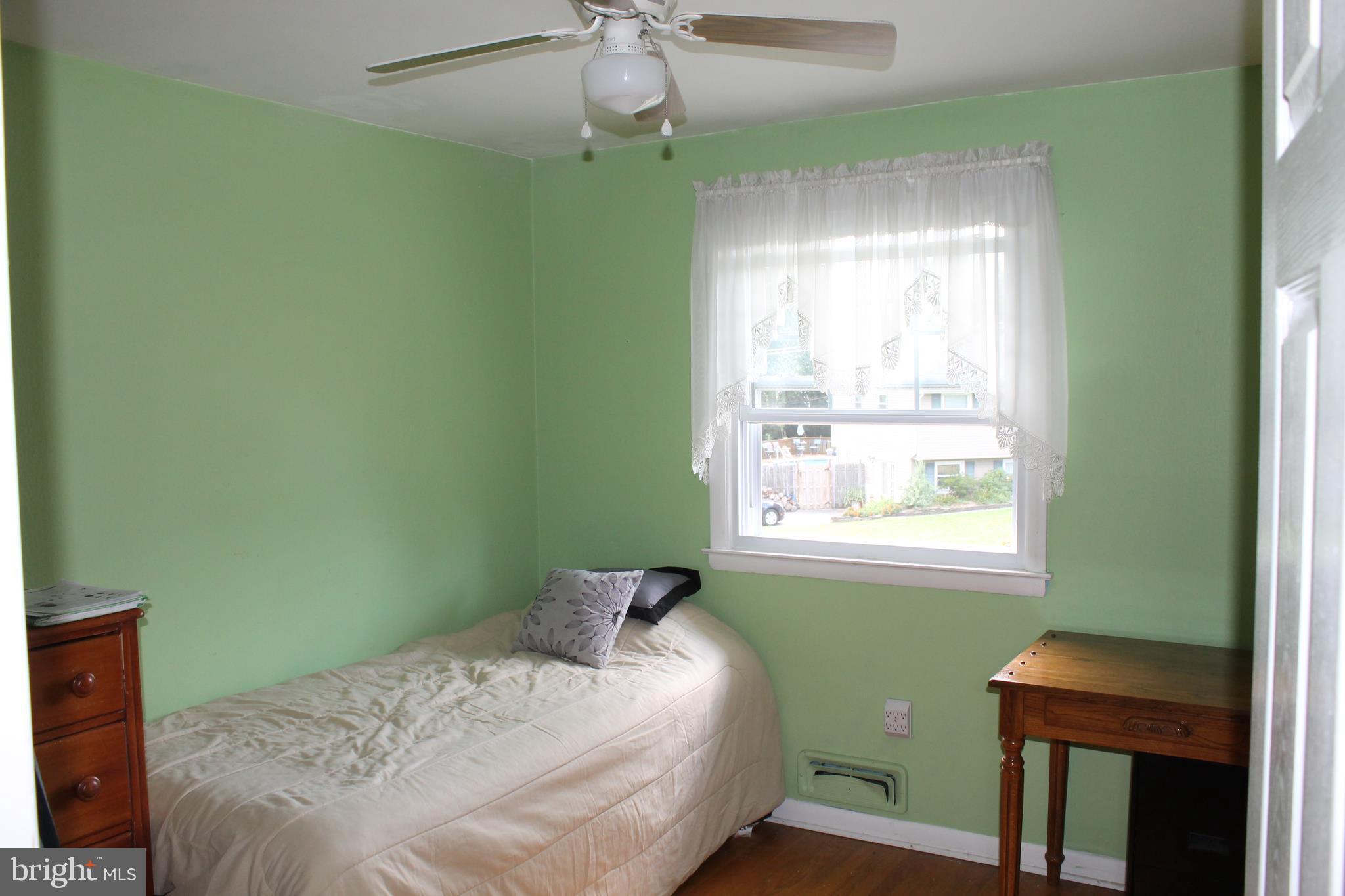 35 Overhill Road Stratford, NJ 08084 - Photo 27 of 43 a bedroom with a bed window and a desk