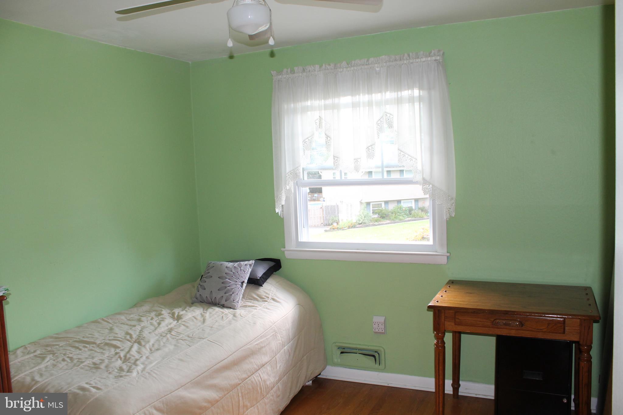 35 Overhill Road Stratford, NJ 08084 - Photo 28 of 43 a bedroom with a bed and a window