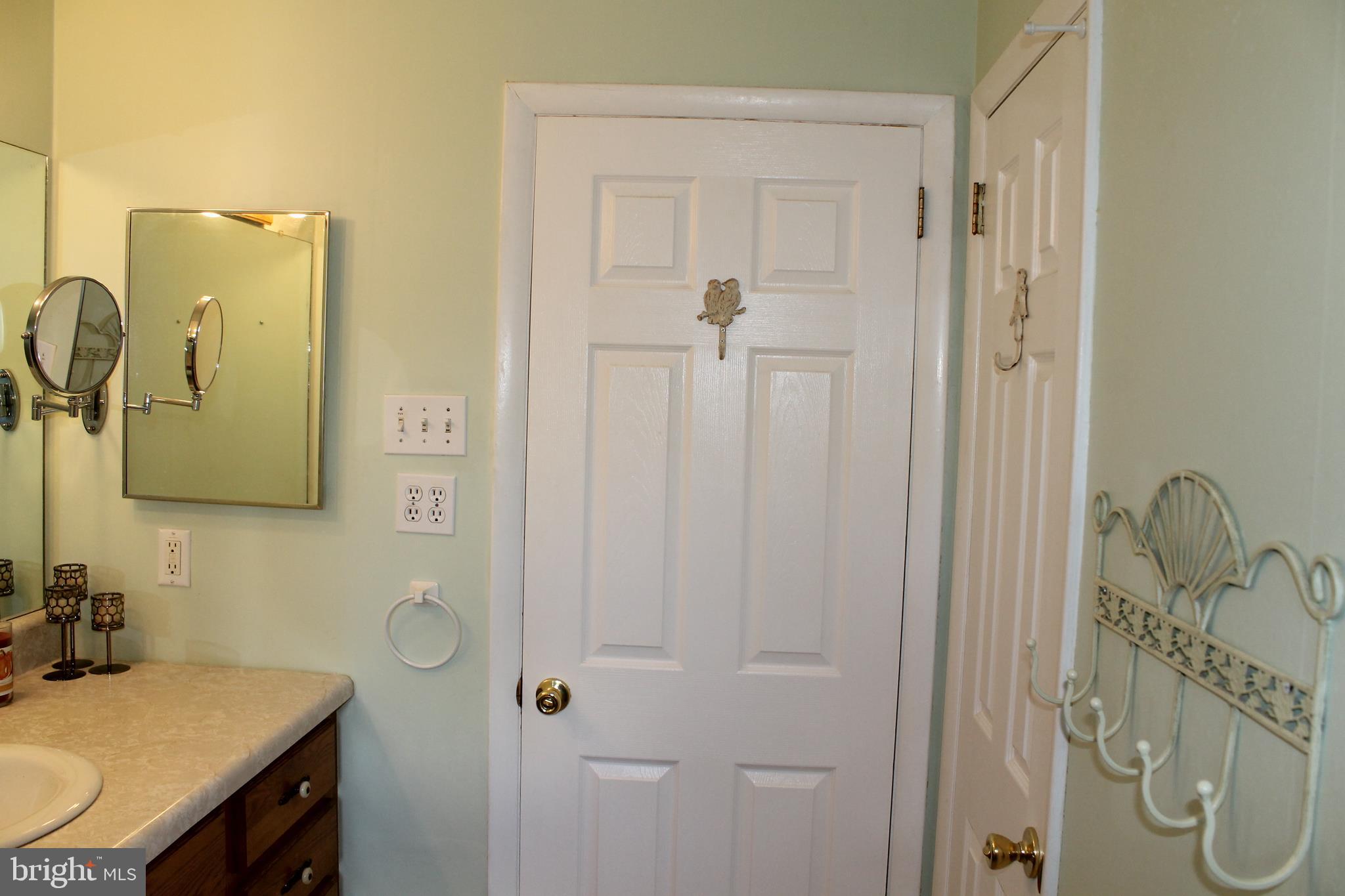 35 Overhill Road Stratford, NJ 08084 - Photo 29 of 43 a bathroom with a shower a sink and a mirror