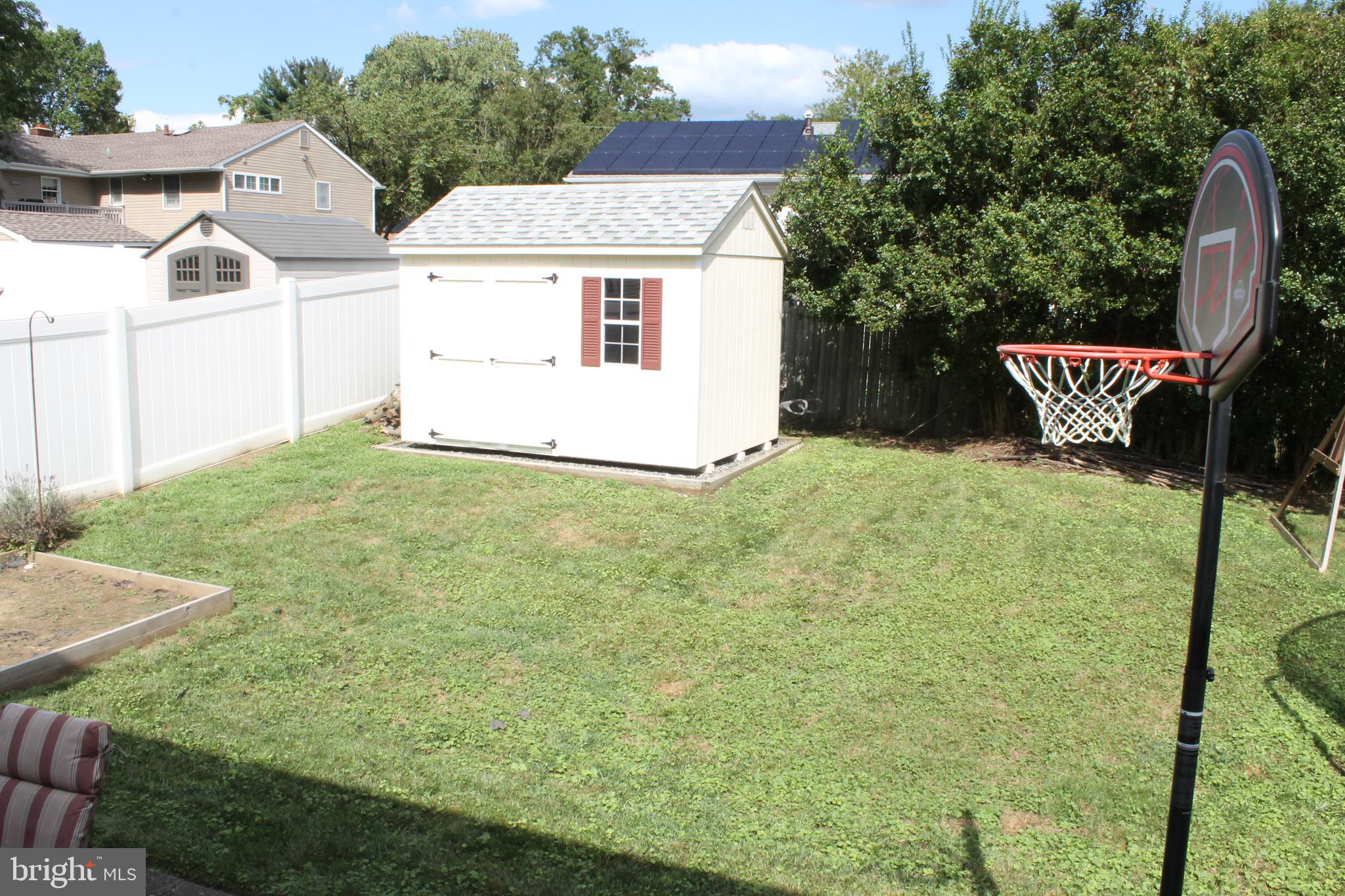 35 Overhill Road Stratford, NJ 08084 - Photo 41 of 43 a view of a house with backyard and a garden