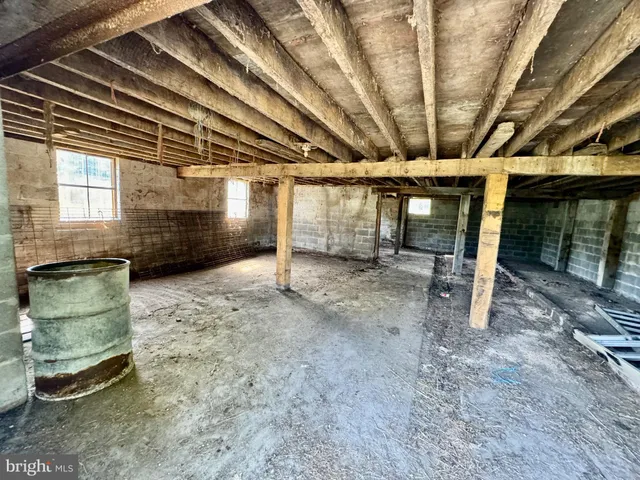 a view of a room with wooden walls
